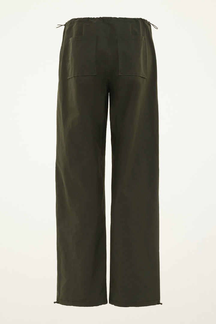 Dark green pants with a drawstring waist and big back pockets on a grey background