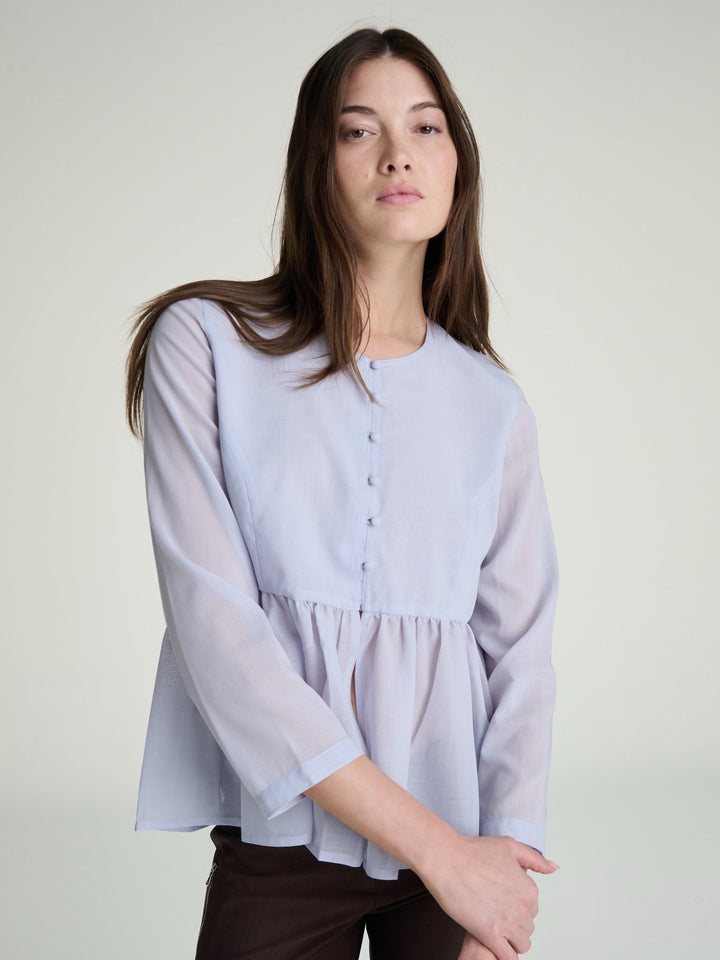 Kaia Peplum Blouse | Light Blue - SULLIVAN