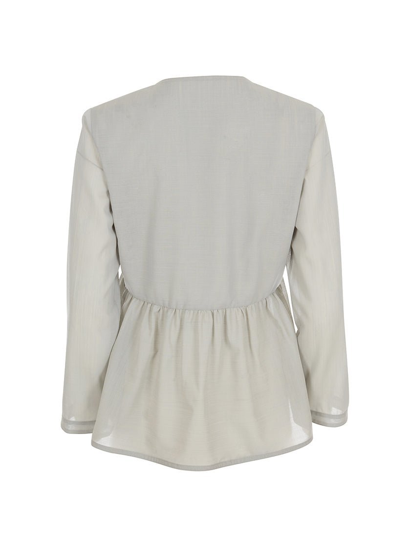 Back view of light gray, long-sleeved, peplum-style top against a white background. 