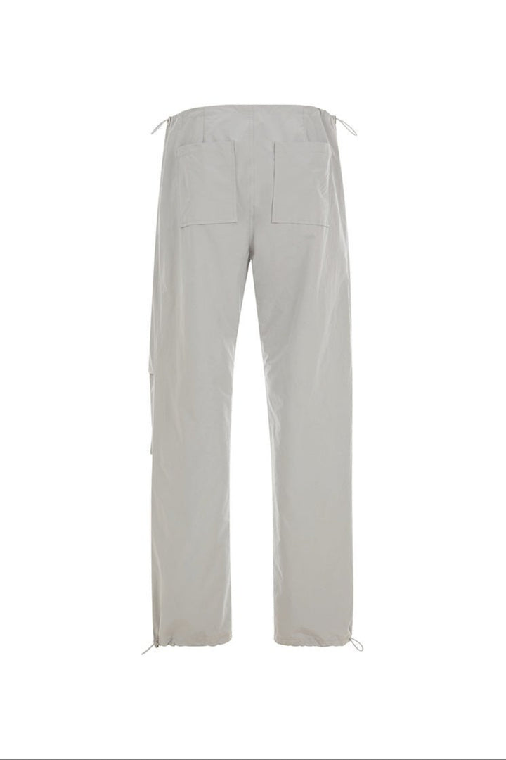 Light grey pants on a white background.