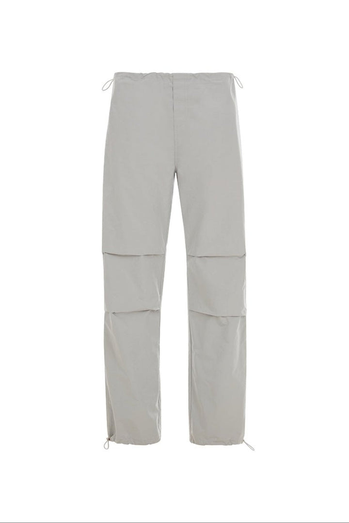 Front view of light grey pants on a white background.