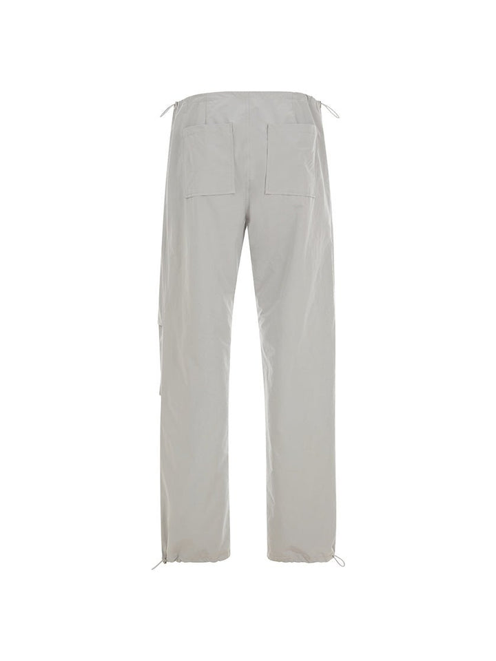 Light grey pants on a white background.