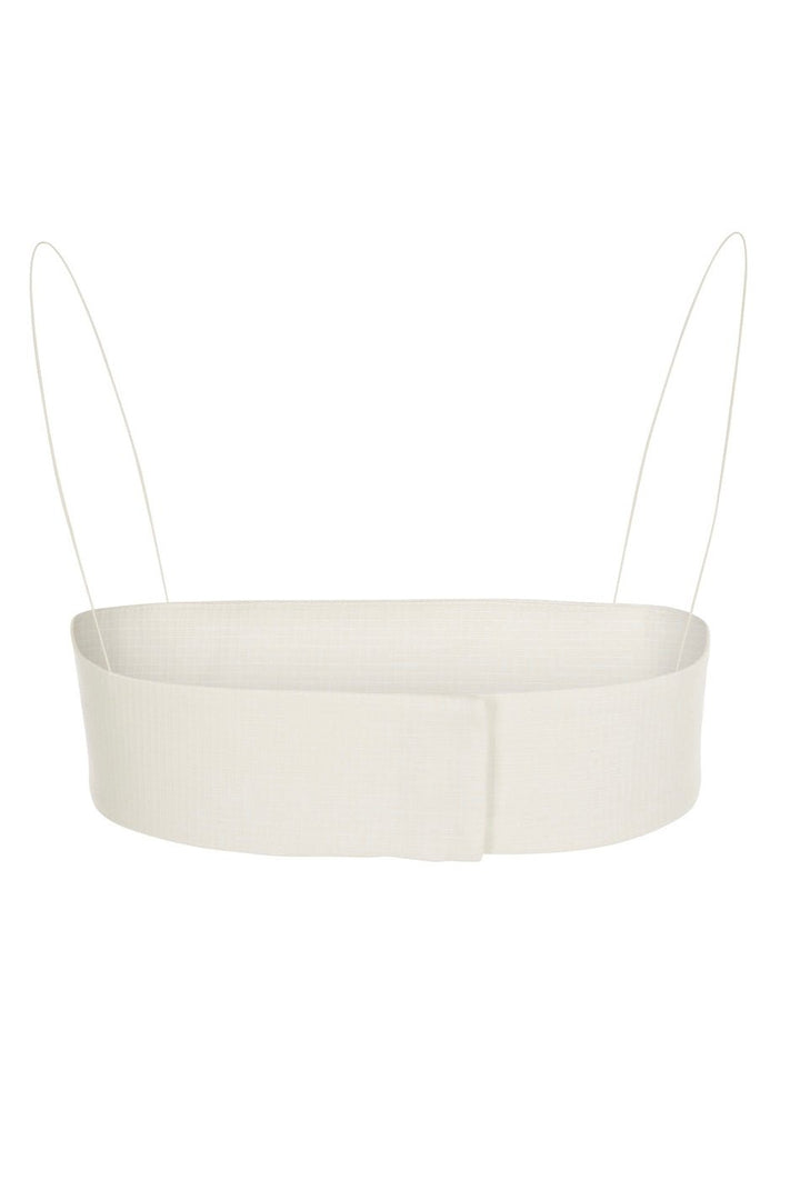Back view of white bandeau top with thin spaghetti straps, set against a plain white background.