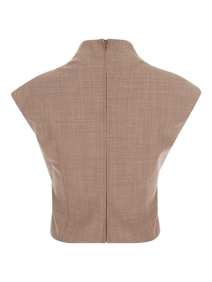 Back view of beige sleeveless high neck top with a structured fit, displayed on a white background. 