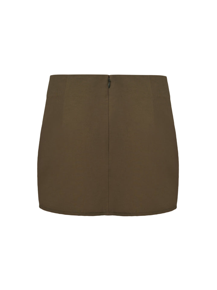 Moss green mini skirt with an invisible back zip on a grey background