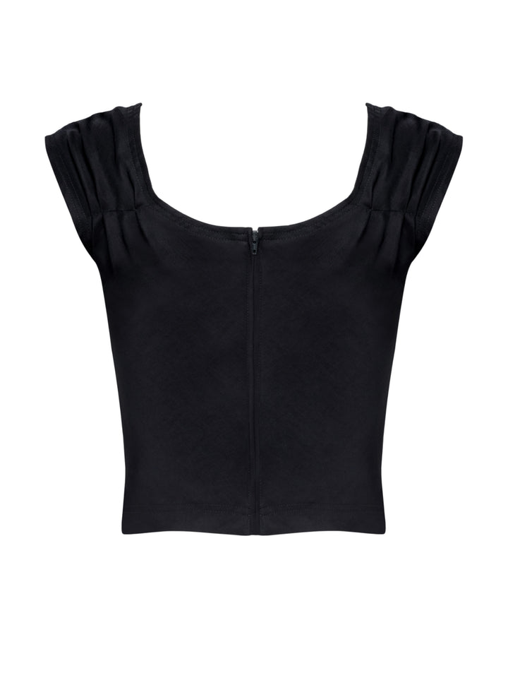 Black top with ruffled shoulders on a white background