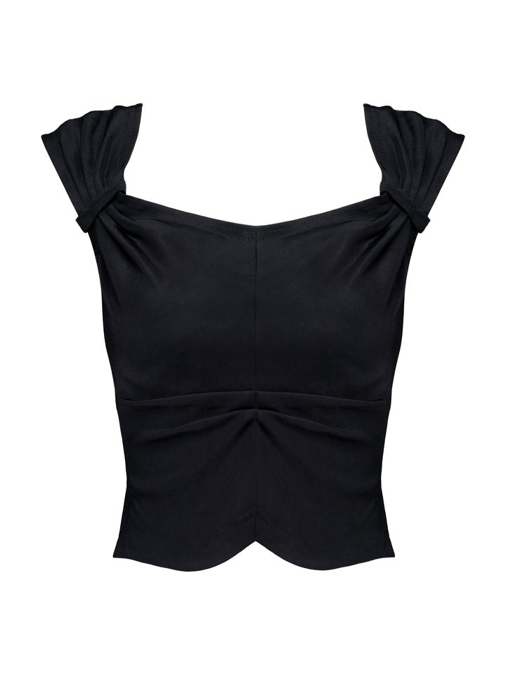 Black top with ruched shoulders on a grey background