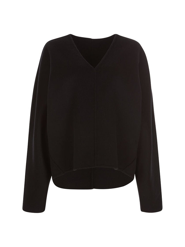 Black V-neck sweater with long sleeves. The sweater has an oversized fit and is displayed against a light grey background.