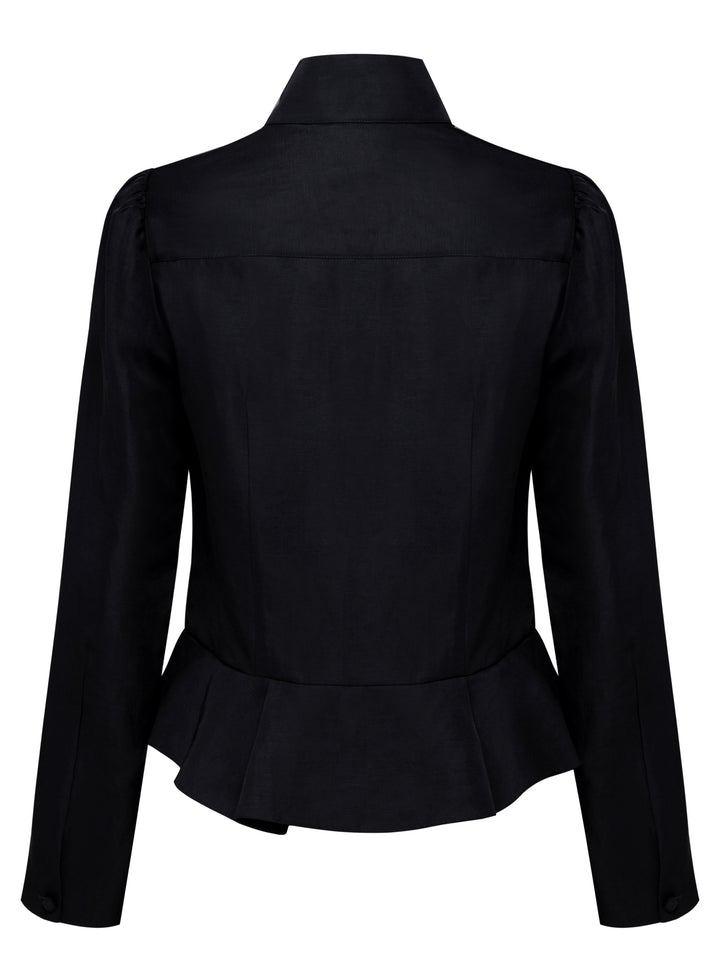 Black jacket with peplum waist and high collar seen from the back on a grey background