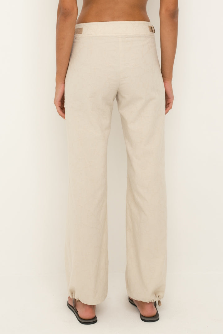 On-model back view of women’s sand jacquard billow pants with ankle drawstrings