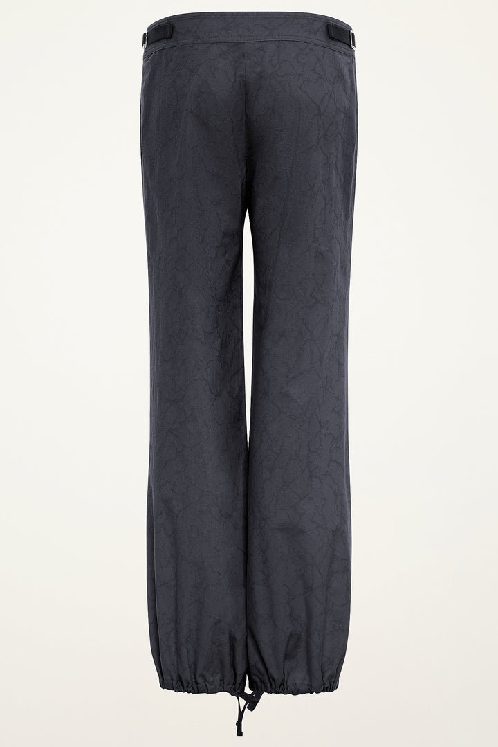 Back product view of women’s steel jacquard billow pants with ankle drawstrings.