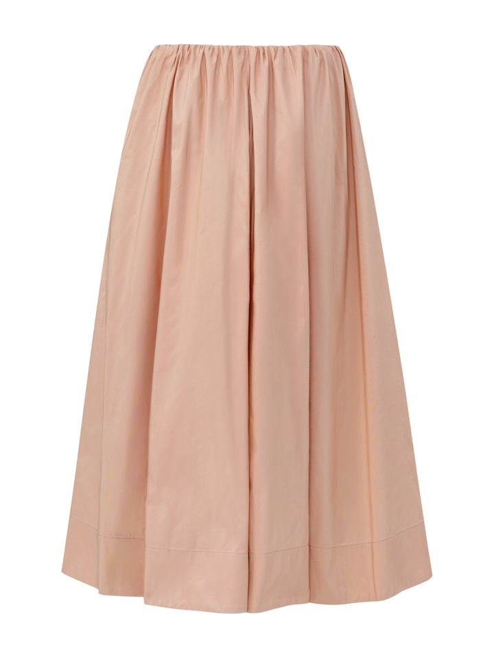 Pink taffeta skirt on a grey background