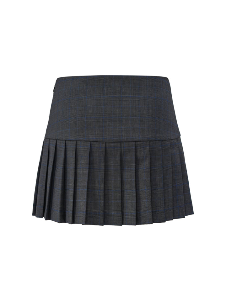 Dark grey and navy glen plaid pleated skirt with a drop waist on a white background